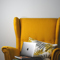 Yellow chair with a laptop